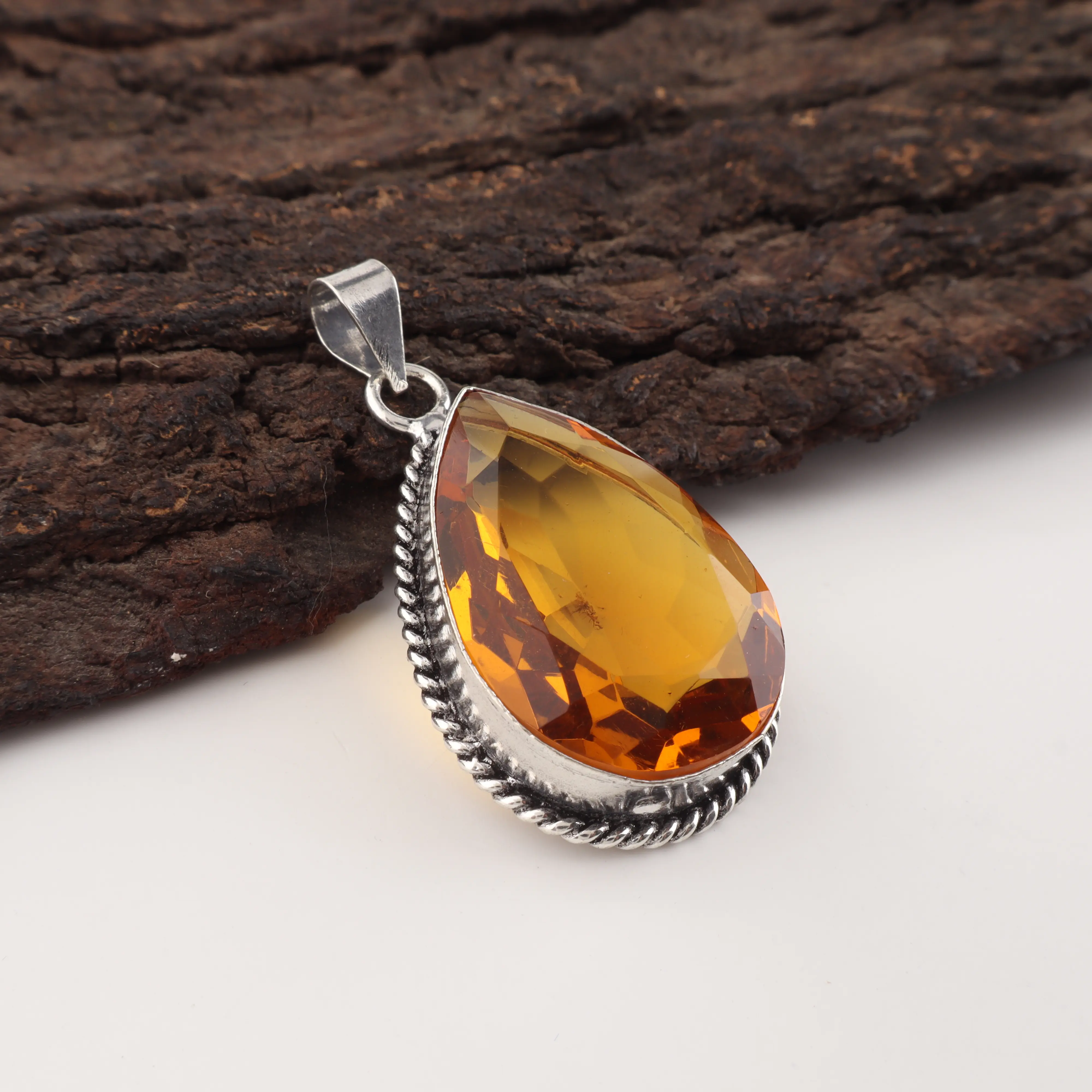 Citrine pendant in 925 sterling silver featuring a yellow gemstone design