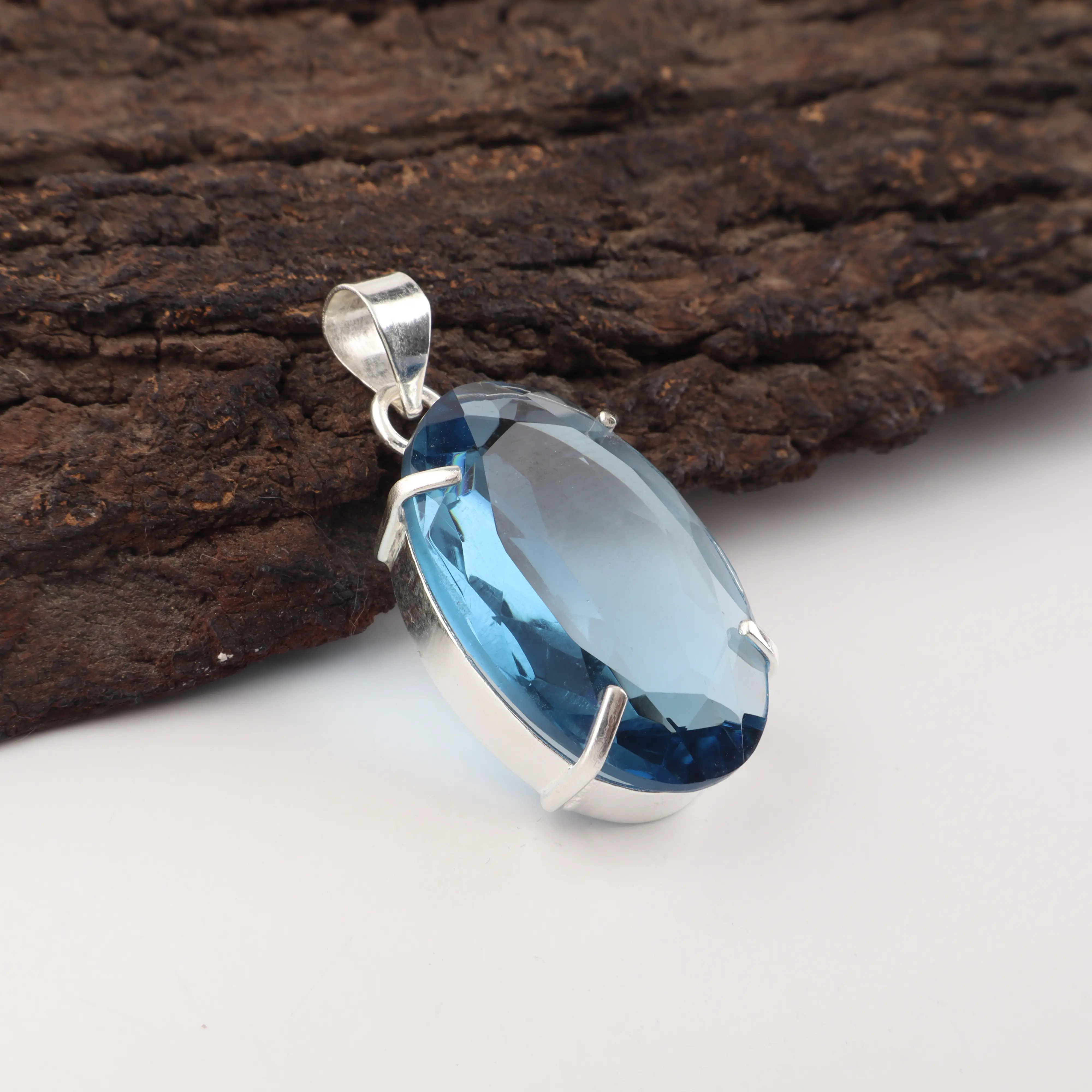 London Blue Topaz pendant with deep blue gemstone in elegant handcrafted jewelry design