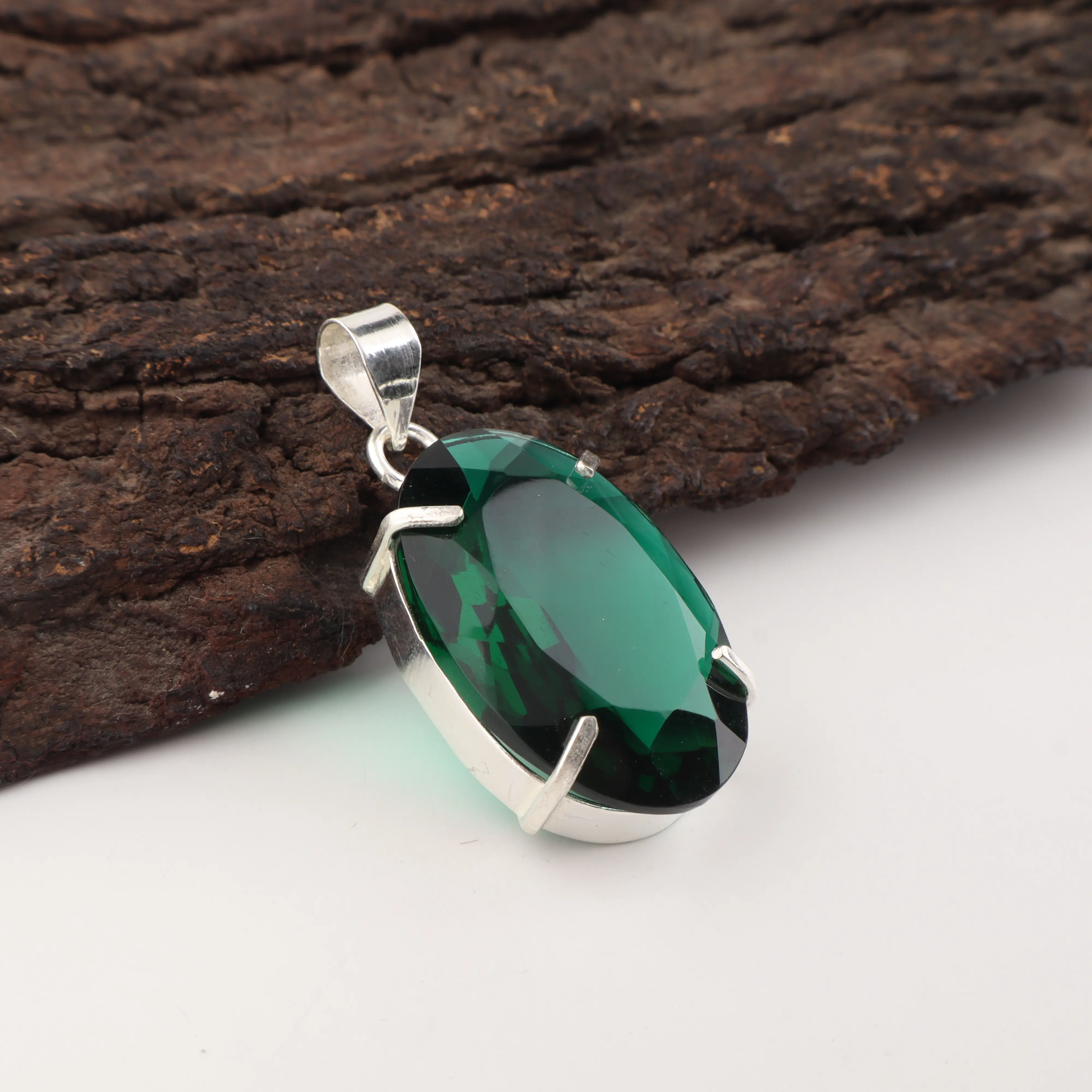 Green emerald pendant in silver setting elegant luxury gemstone jewelry for women