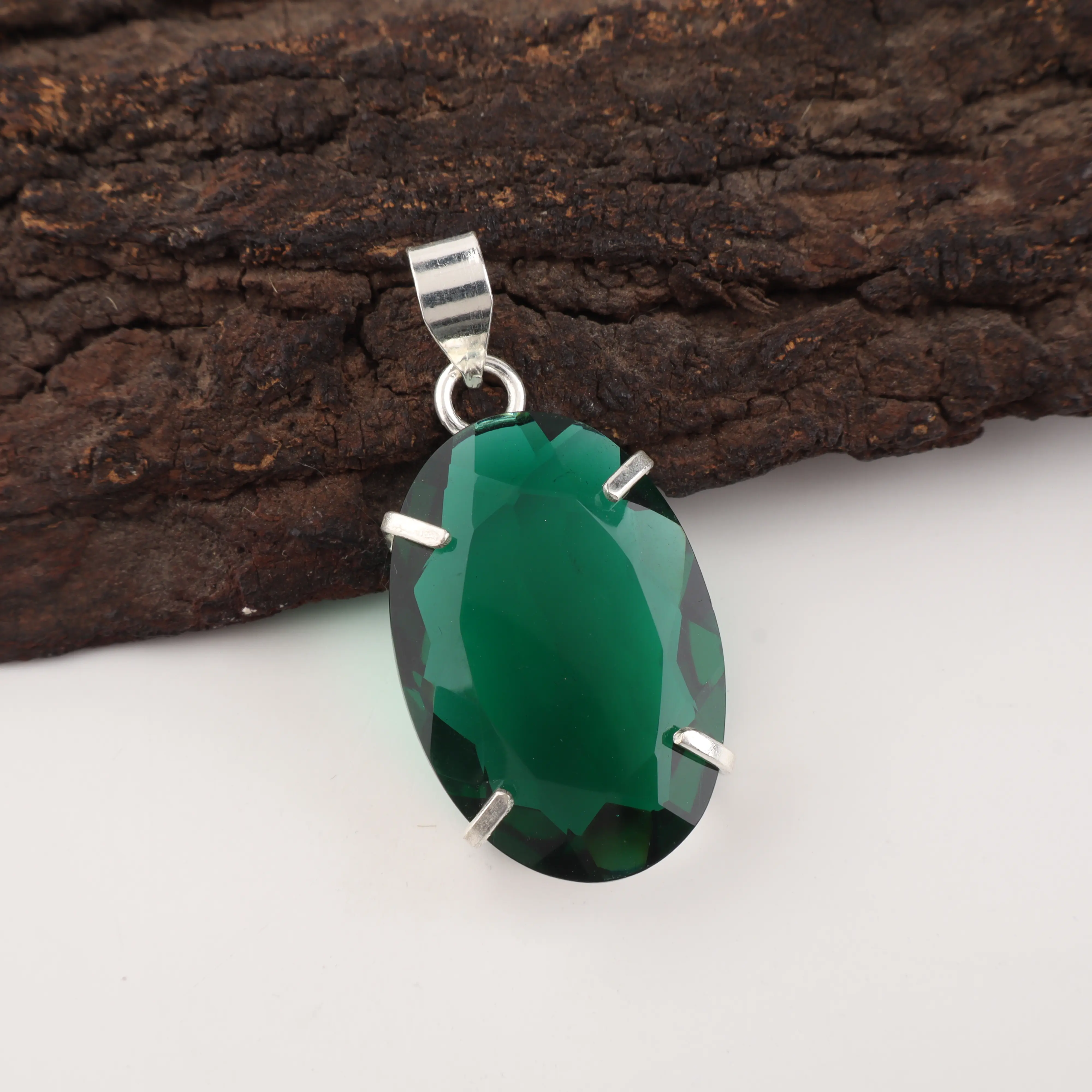 Green emerald pendant in silver setting elegant luxury gemstone jewelry for women
