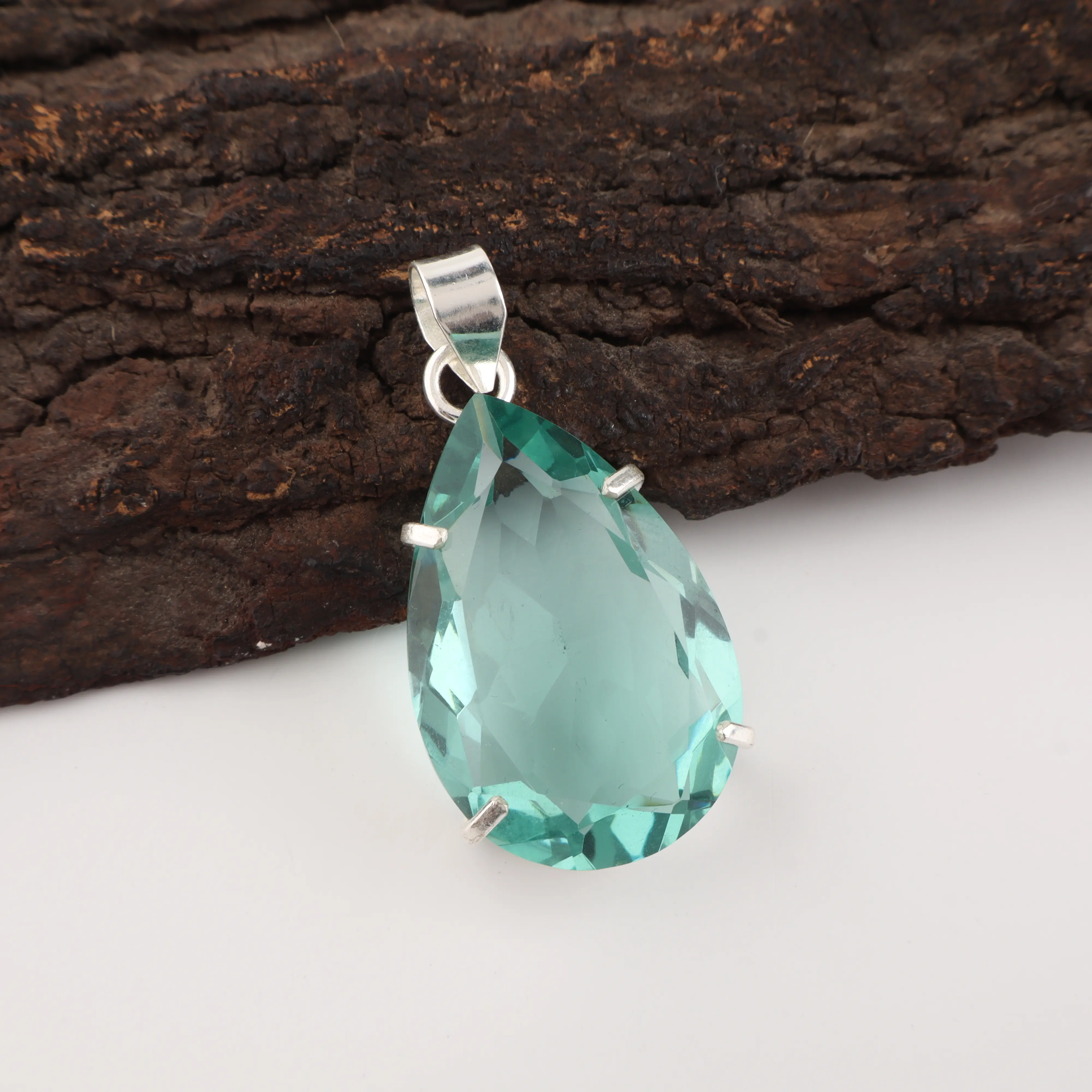 Green Apatite gemstone pendant with vibrant green color in handmade jewelry design
