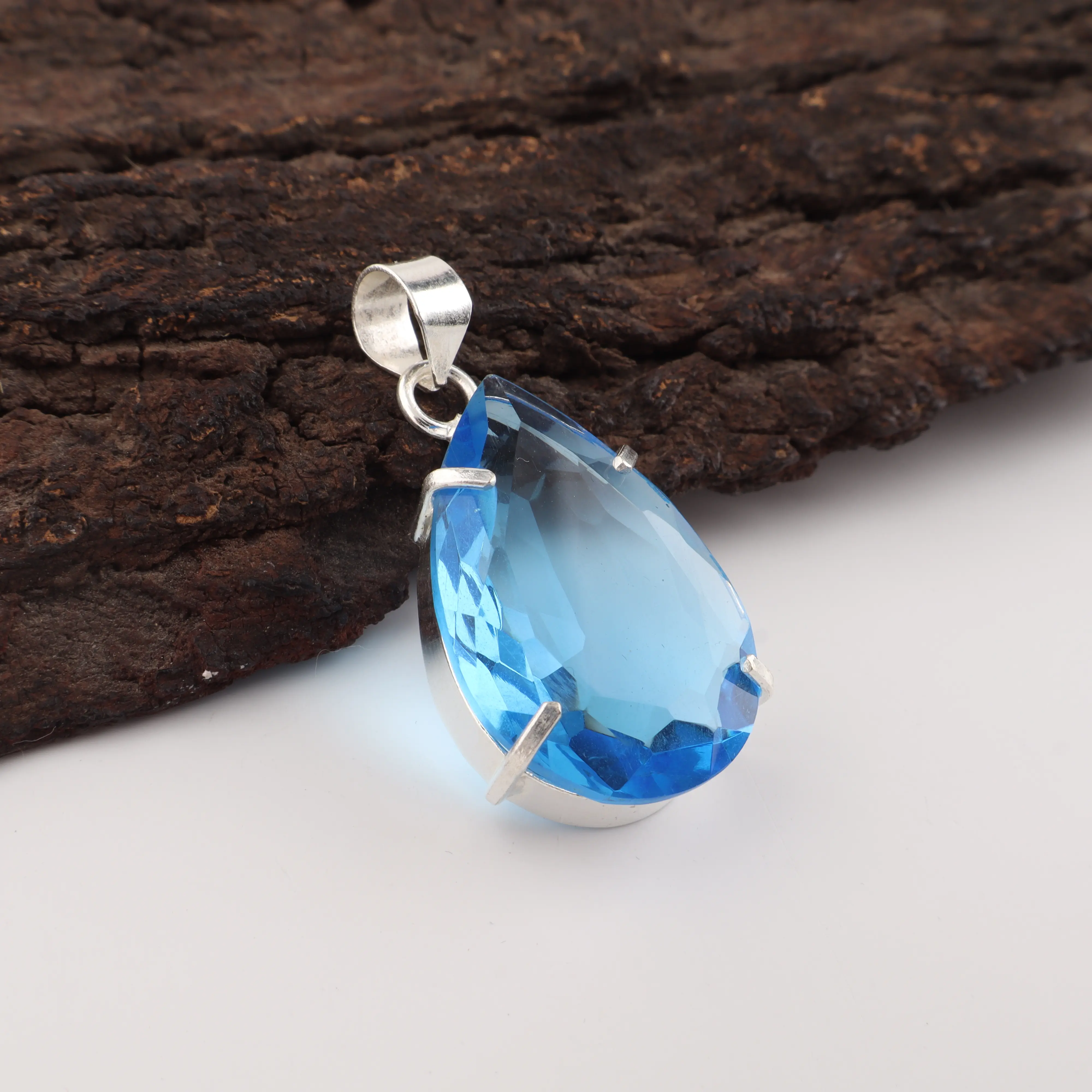 Swiss Blue Topaz pendant with bright sky blue gemstone in silver setting