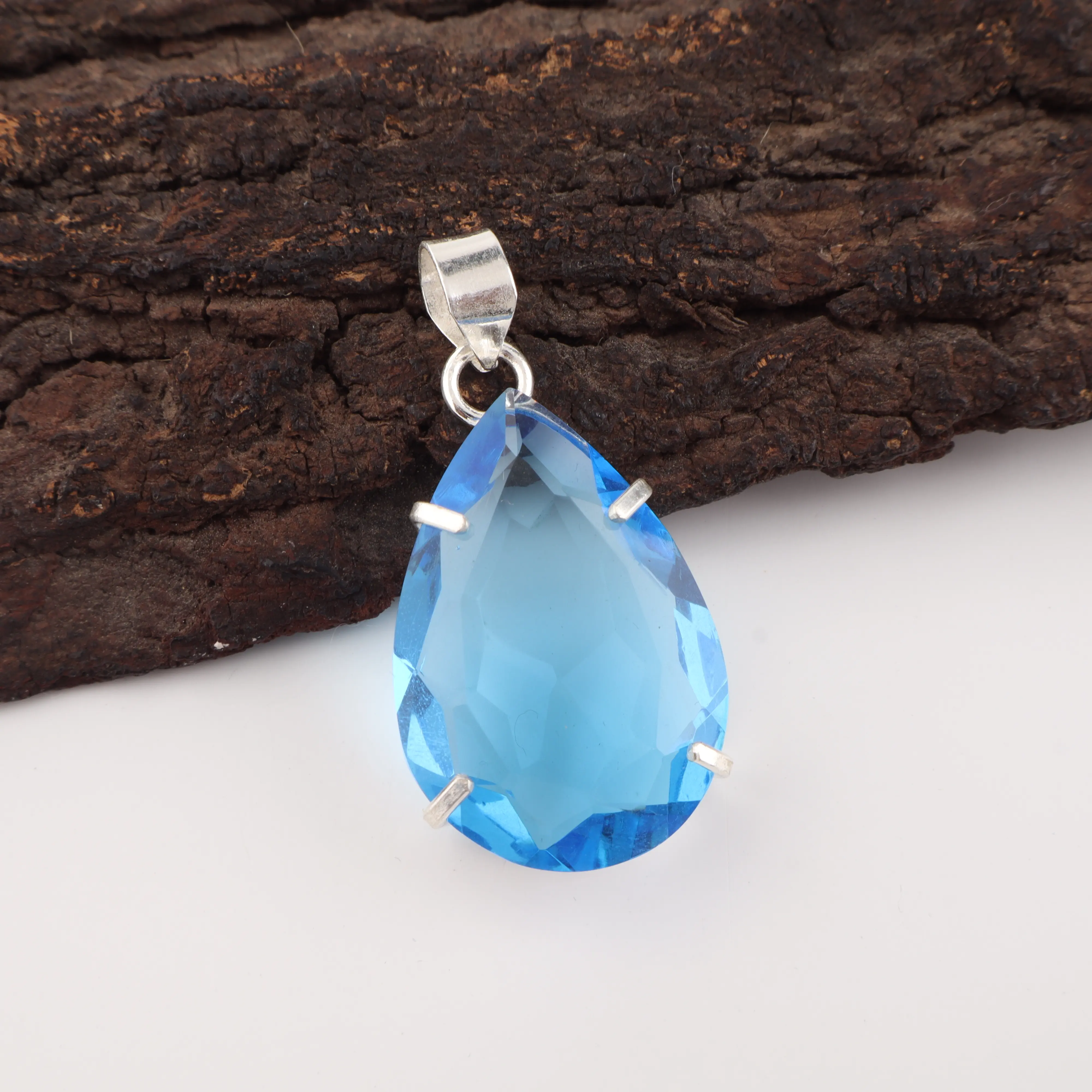 Swiss Blue Topaz pendant with bright sky blue gemstone in silver setting