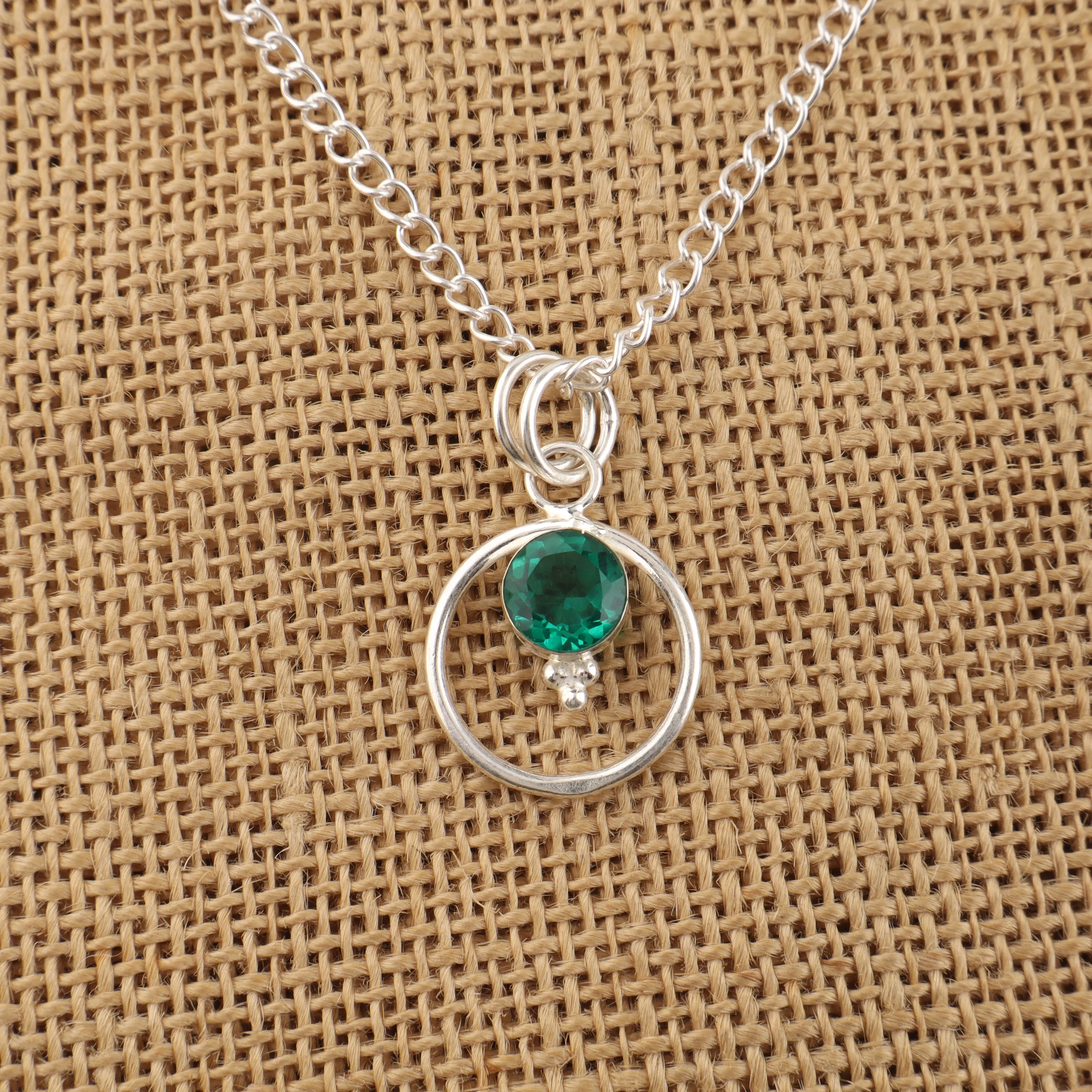 Green Emerald gemstone pendant in handcrafted jewelry design