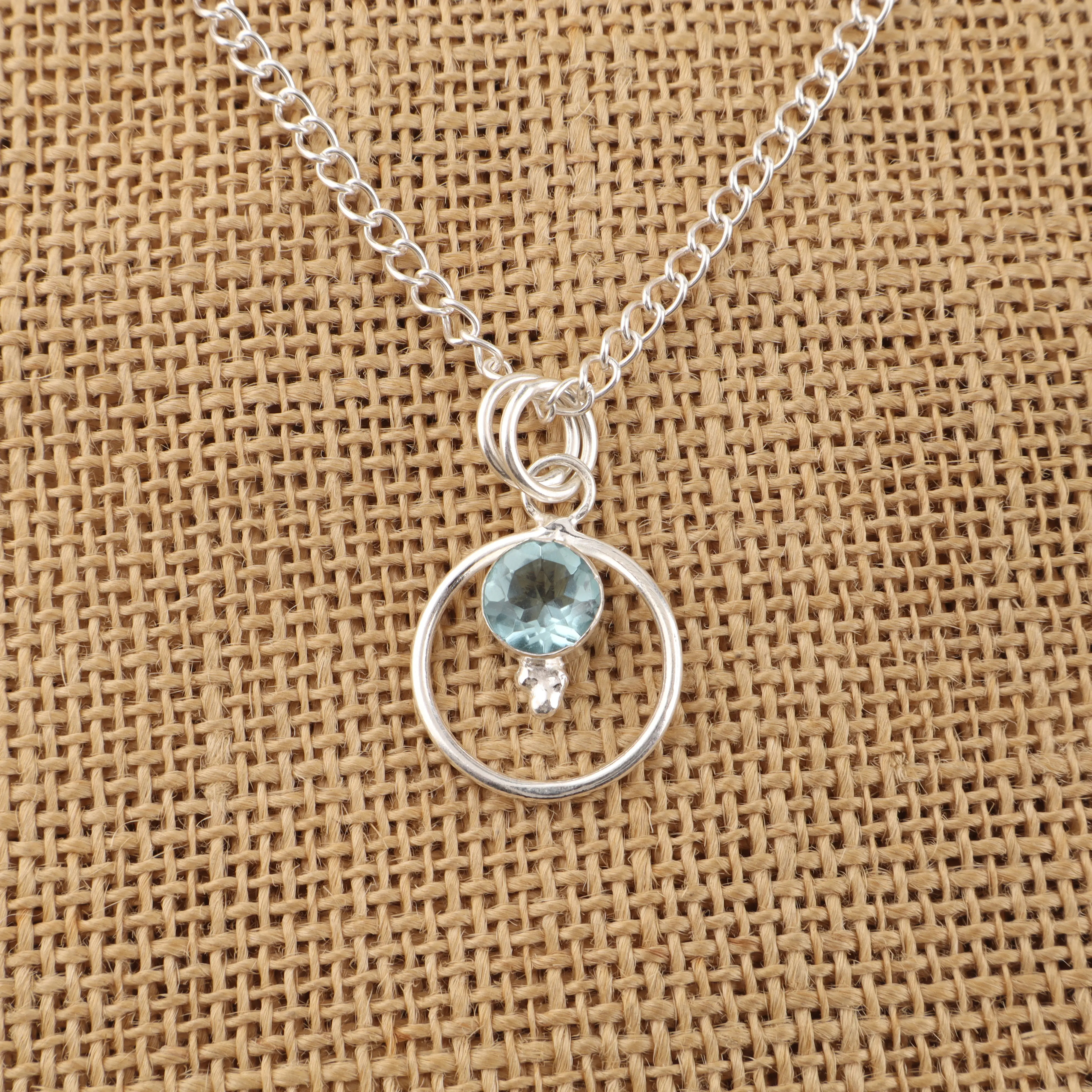 Sky Blue Topaz pendant with light blue gemstone in handcrafted jewelry setting