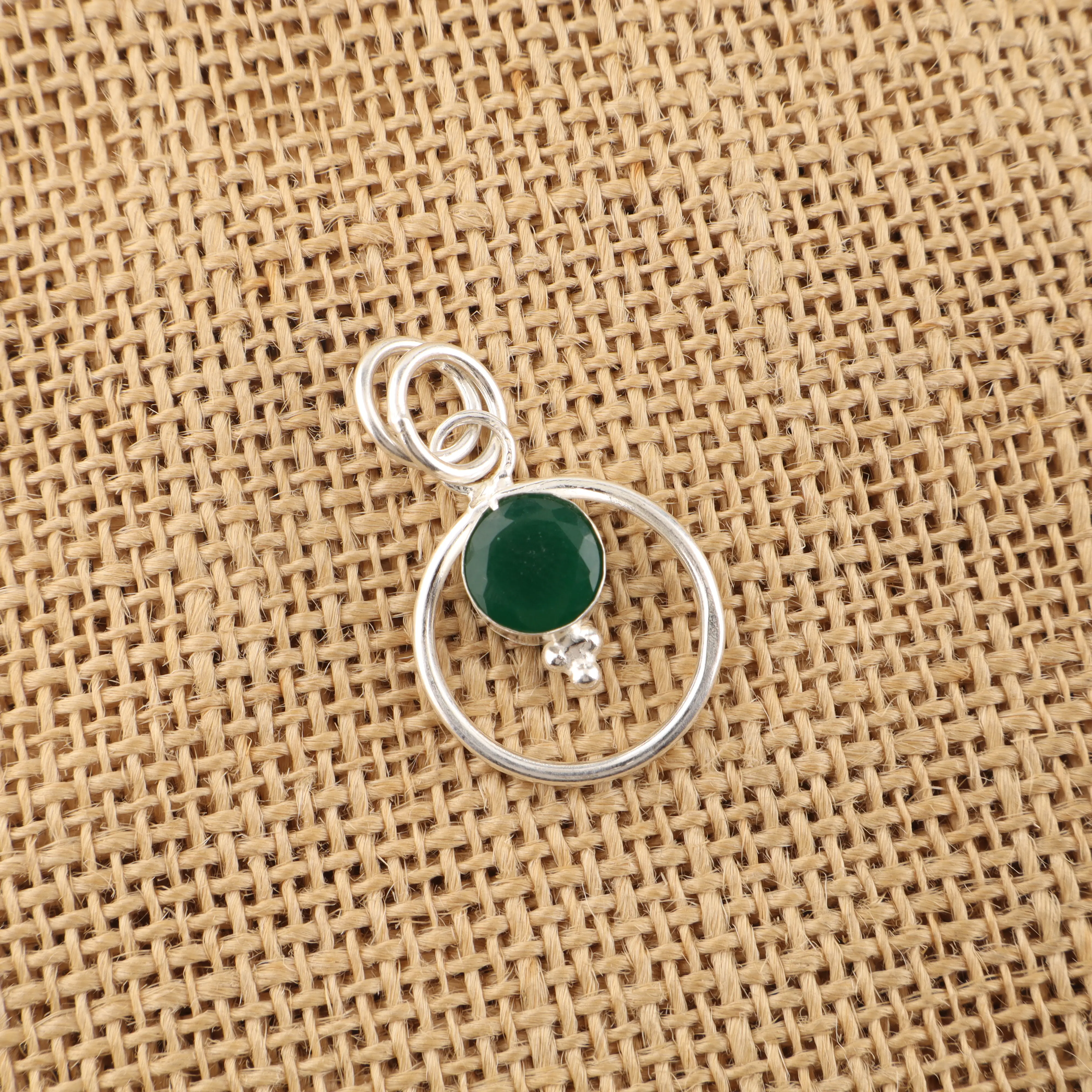 Green Onyx pendant in sterling silver with polished green gemstone design