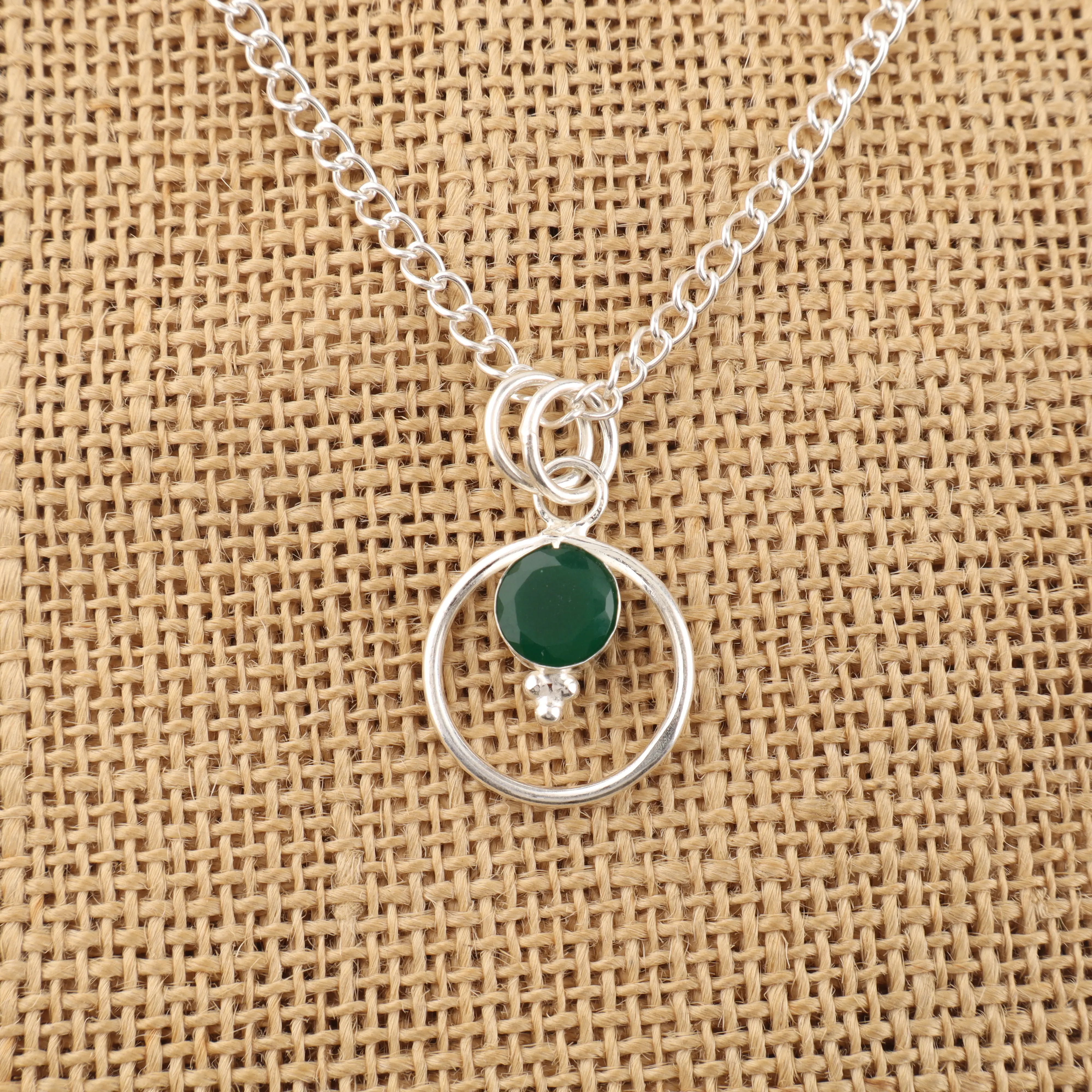 Green Onyx pendant in sterling silver with polished green gemstone design
