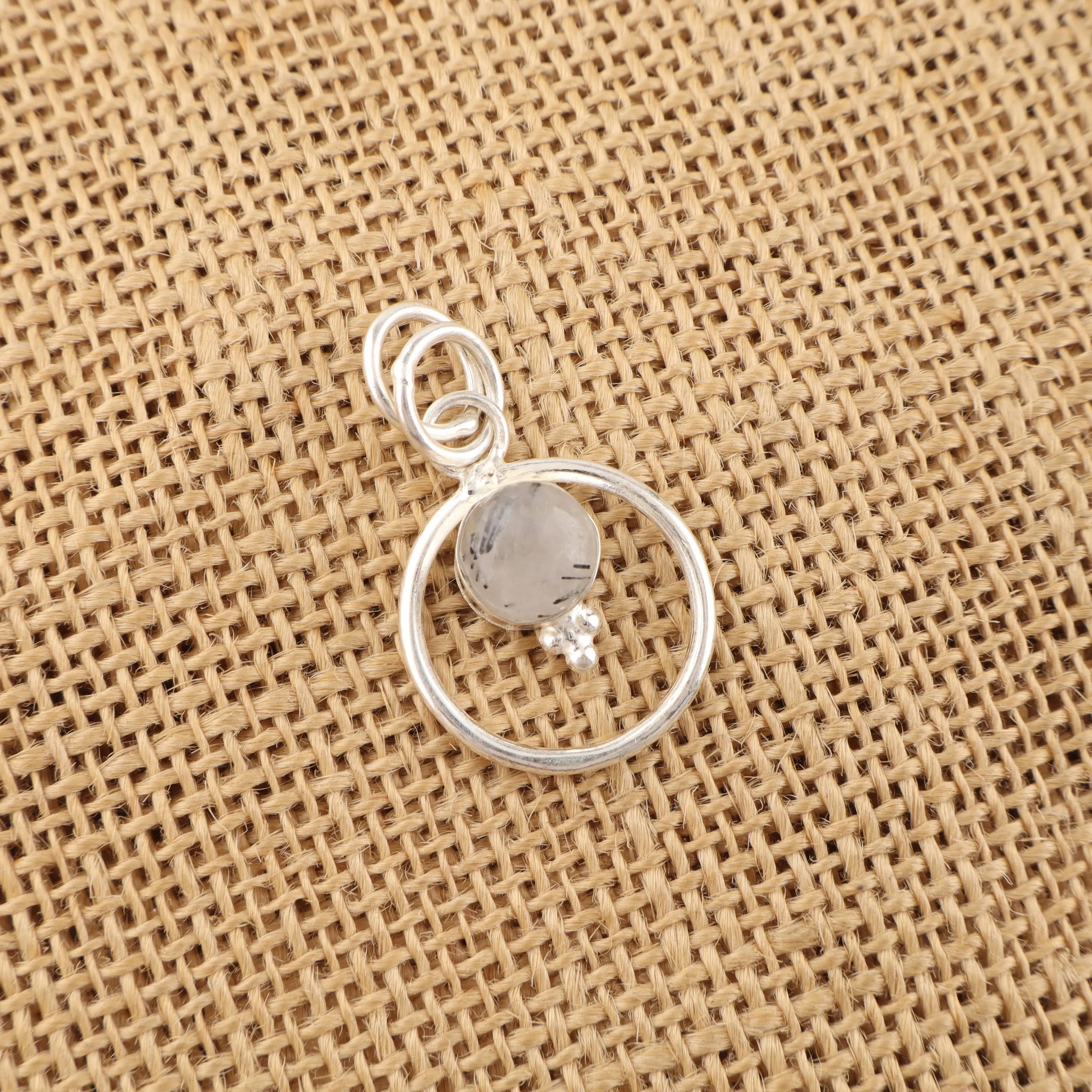 Black rutile quartz pendant with needle inclusions in clear gemstone, handmade jewelry piece