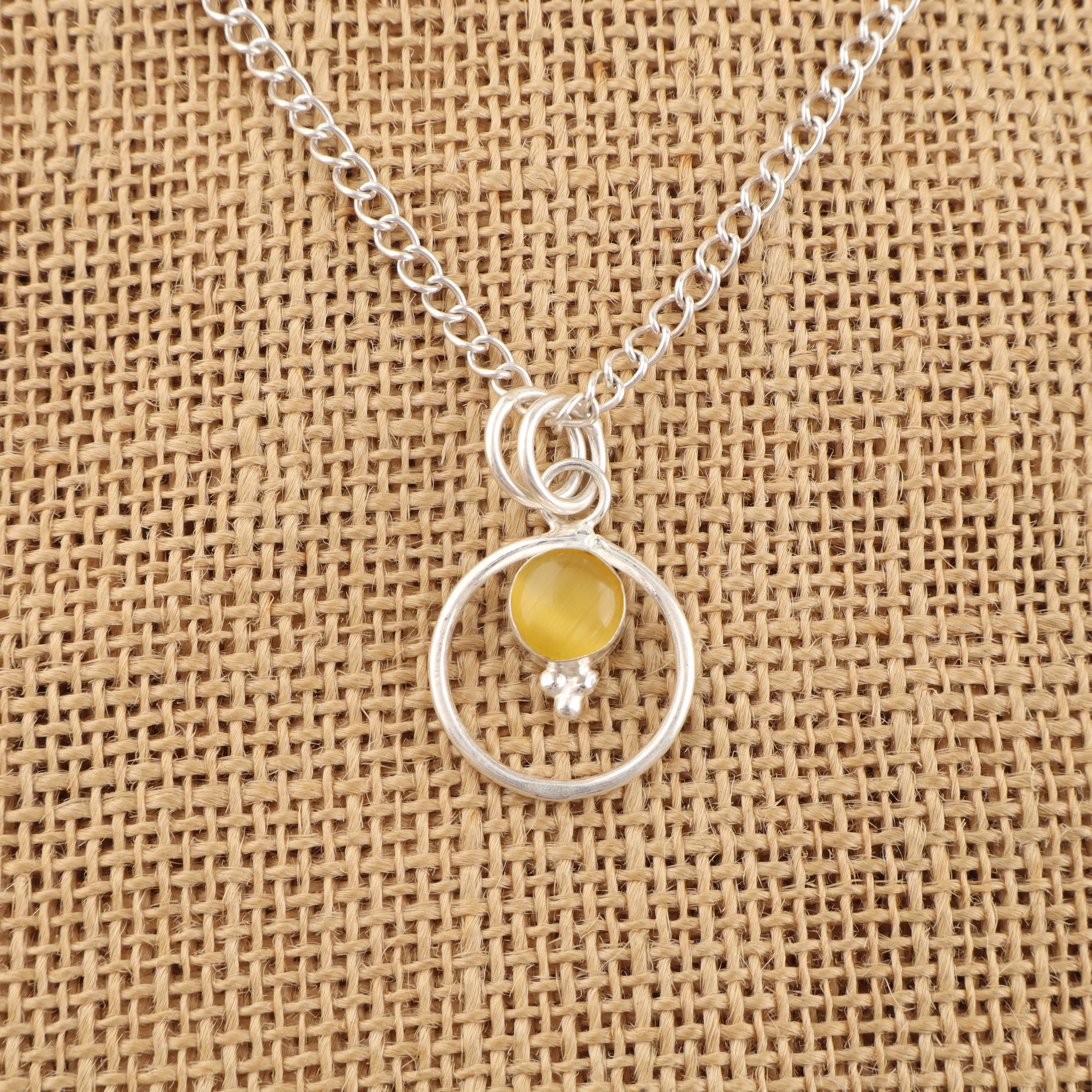 Handmade Yellow Cat's Eye Chrysoberyl Pendant in 925 sterling silver featuring a golden-yellow gemstone with a luminous cat's eye effect.