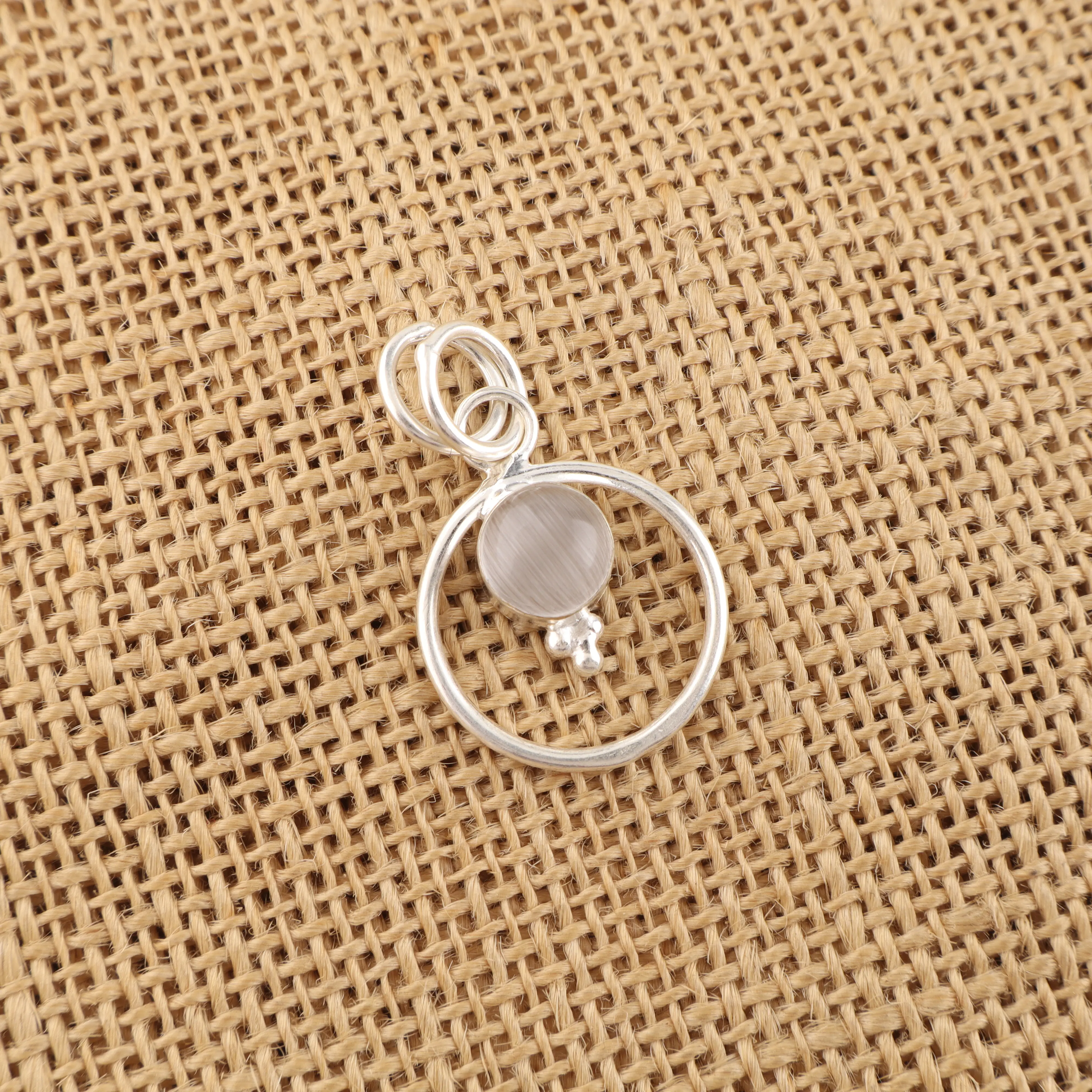 Selenite Pendant set in 925 sterling silver featuring a translucent crystal with a silky glow.