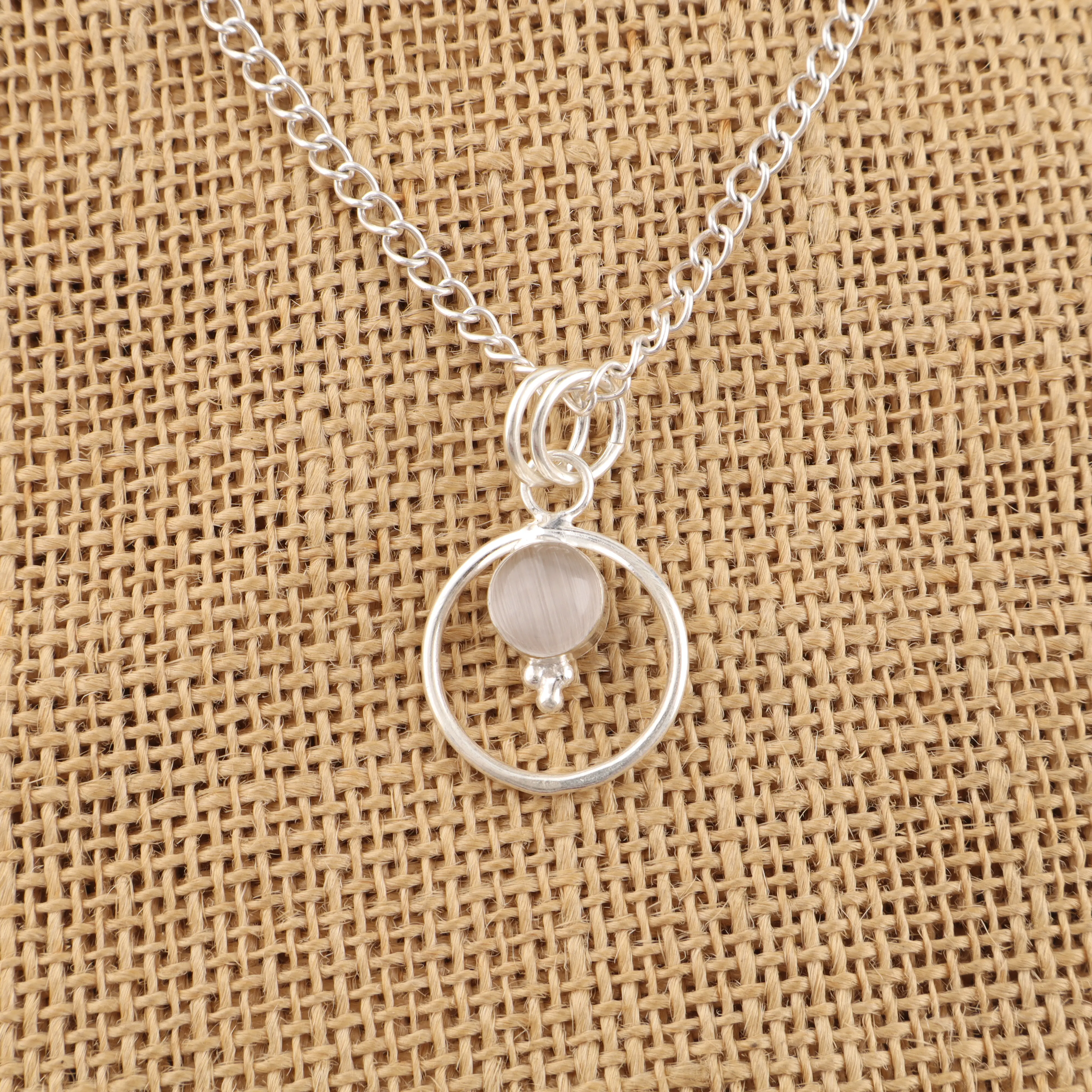 Selenite Pendant set in 925 sterling silver featuring a translucent crystal with a silky glow.