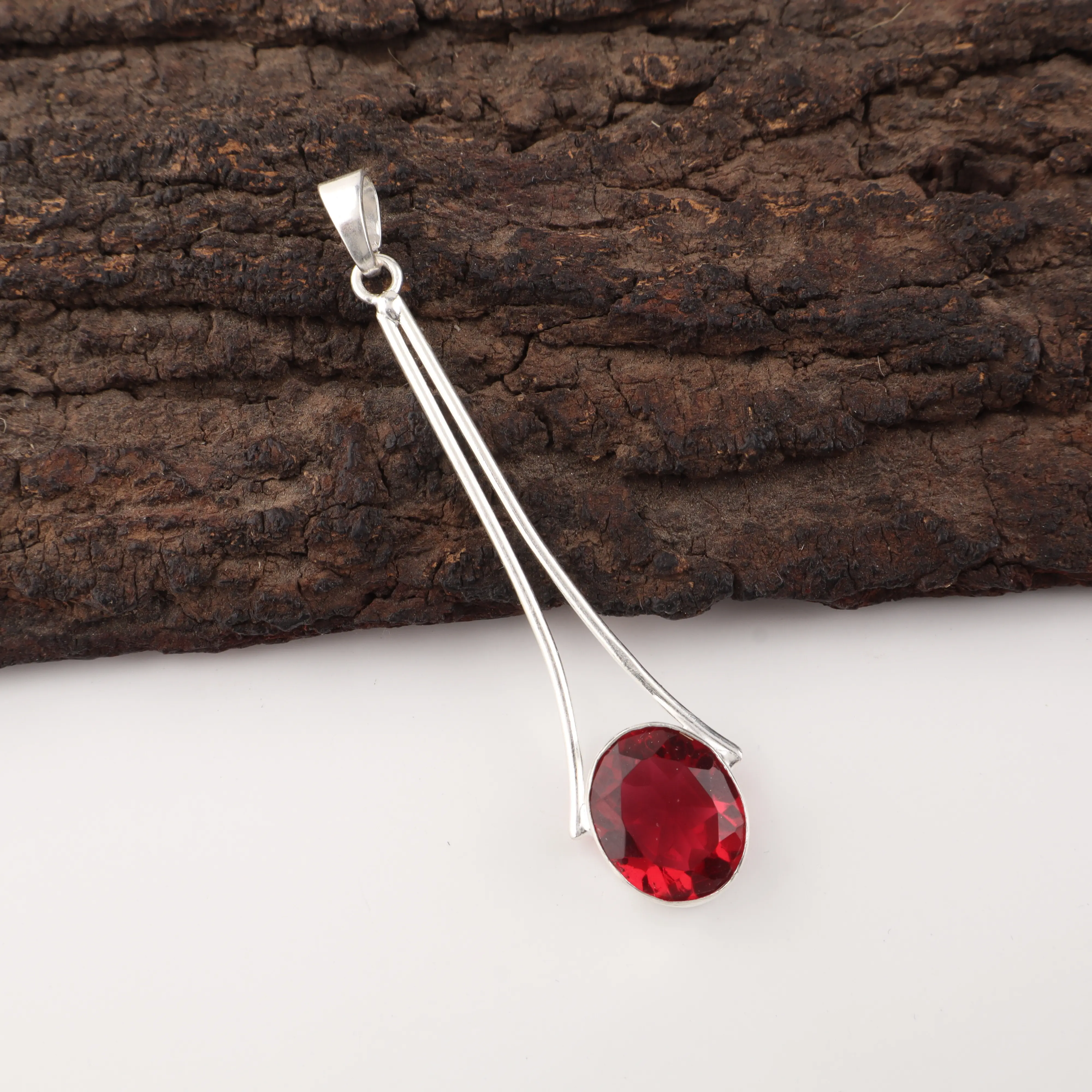 Handcrafted Pink Rubellite pendant in 925 sterling silver featuring a vibrant pink tourmaline gemstone.