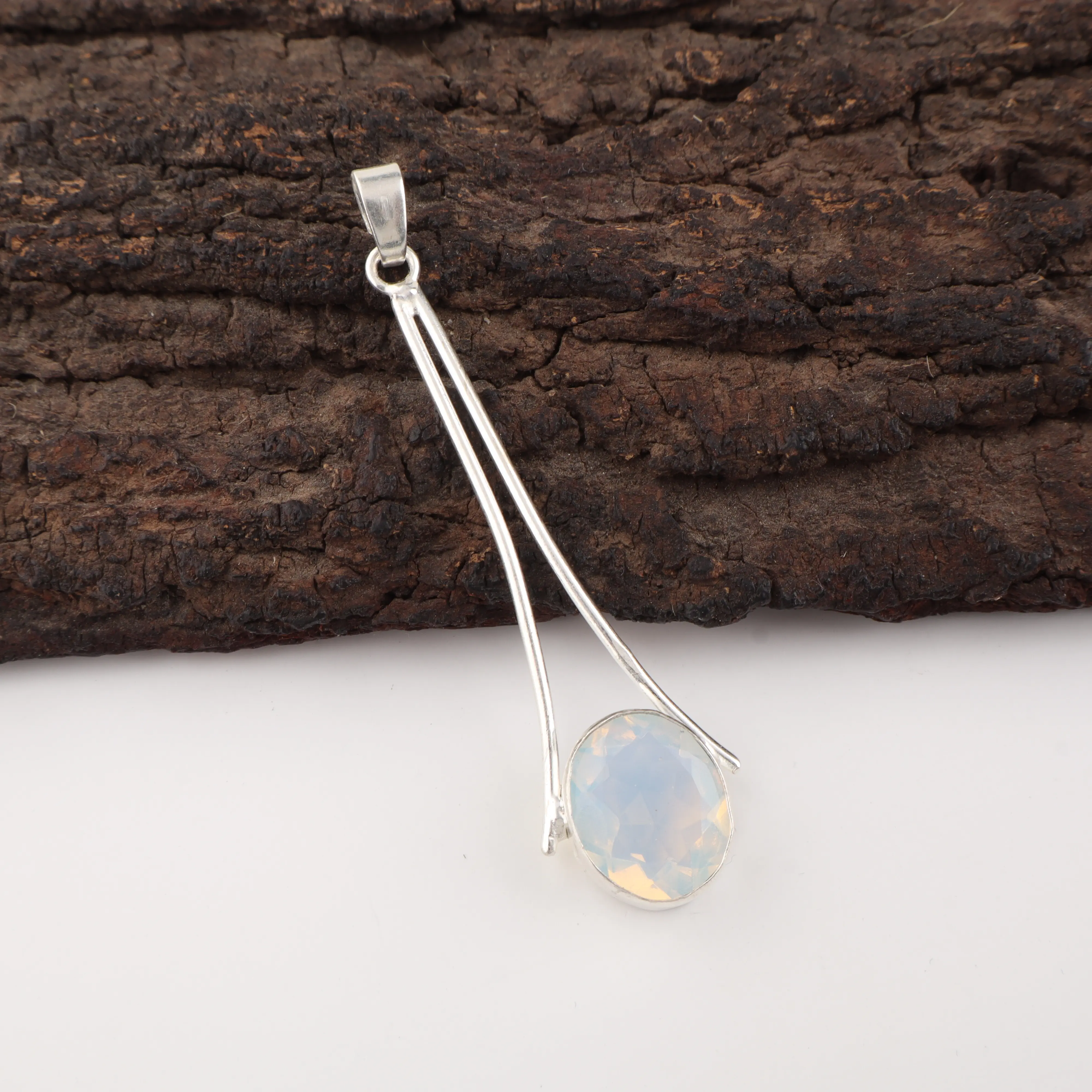 Handmade Milky Opal Pendant in 925 sterling silver featuring white opal gemstone with iridescent flashes.